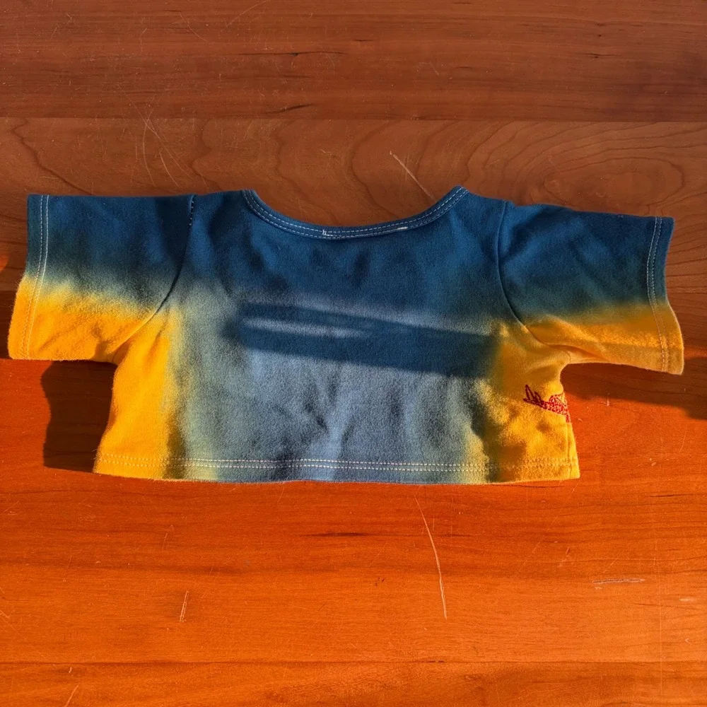 Build-A-Dino Build-A-Bear Tie Dye Dinosaur Embroidered Plush Shirt Blue Yellow